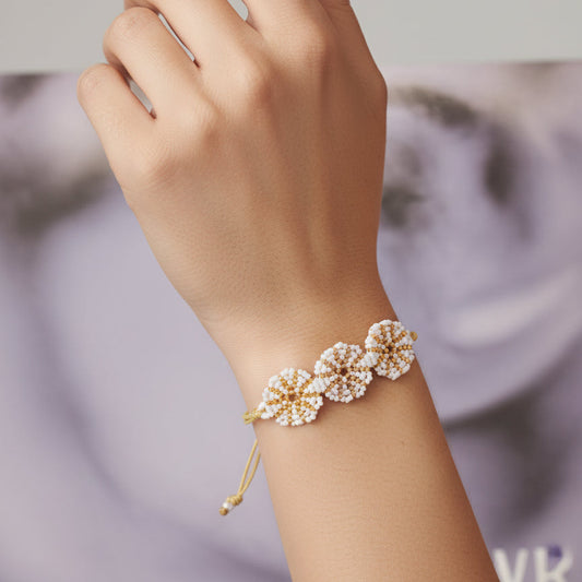 AI model wearings a white rondelles bracelet