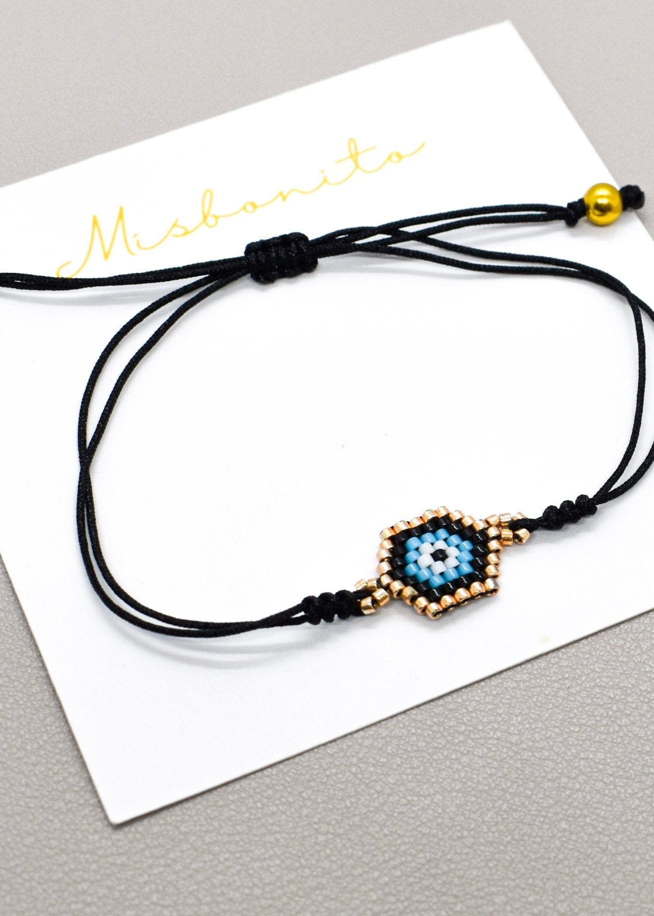 Black small evil eye bracelet