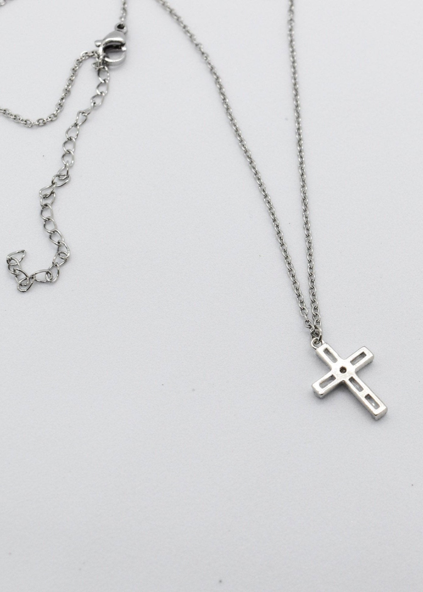 Dainty cross silver necklace back