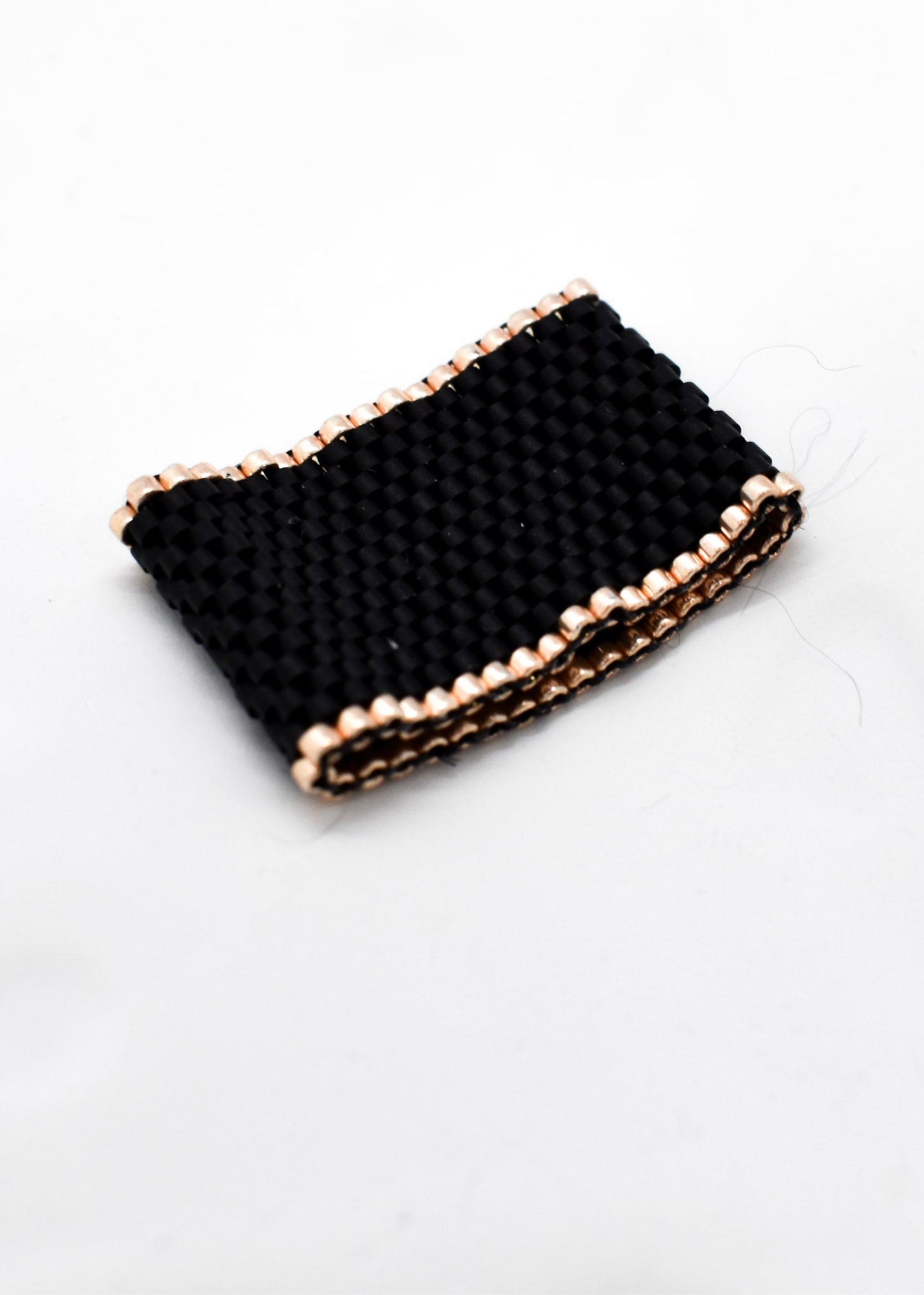 Delica Black ring