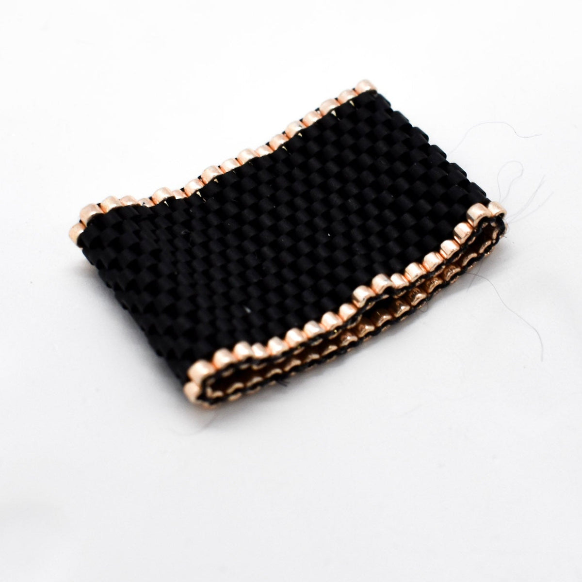 Delica Black ring