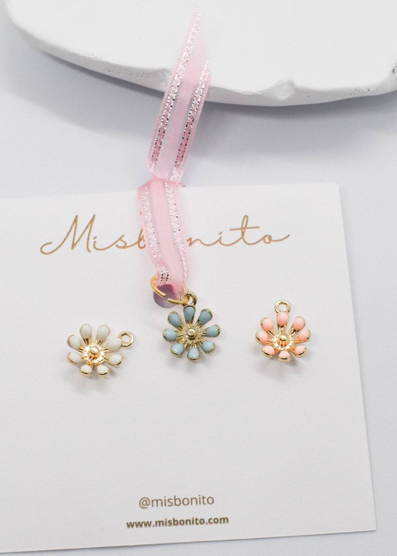 Elevated flower charm
