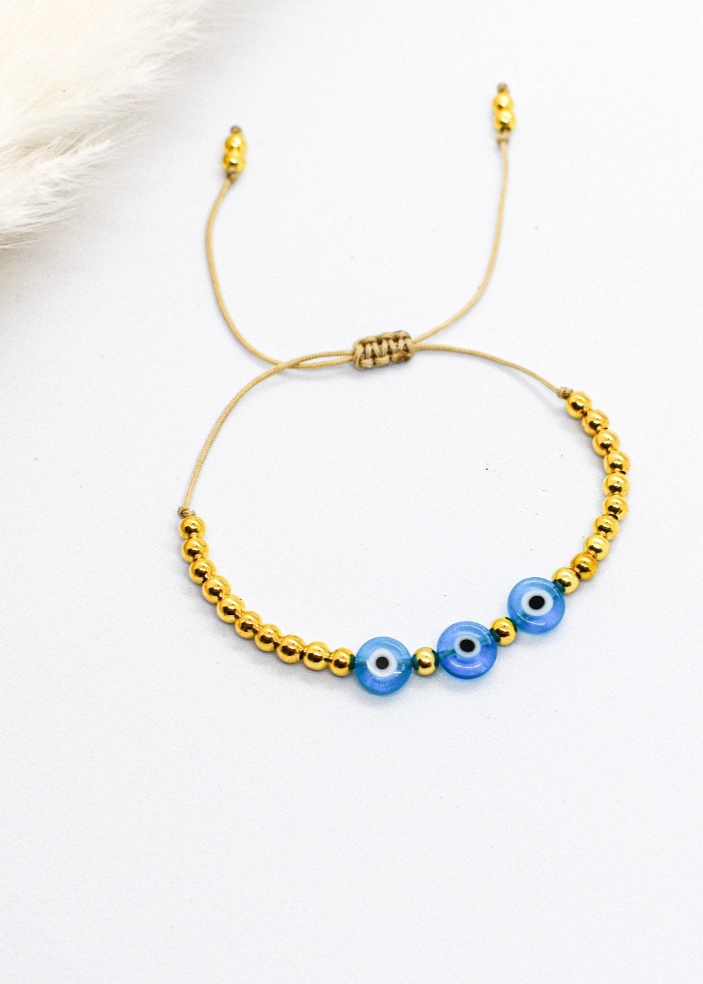 Evil eye blue and gold bracelet
