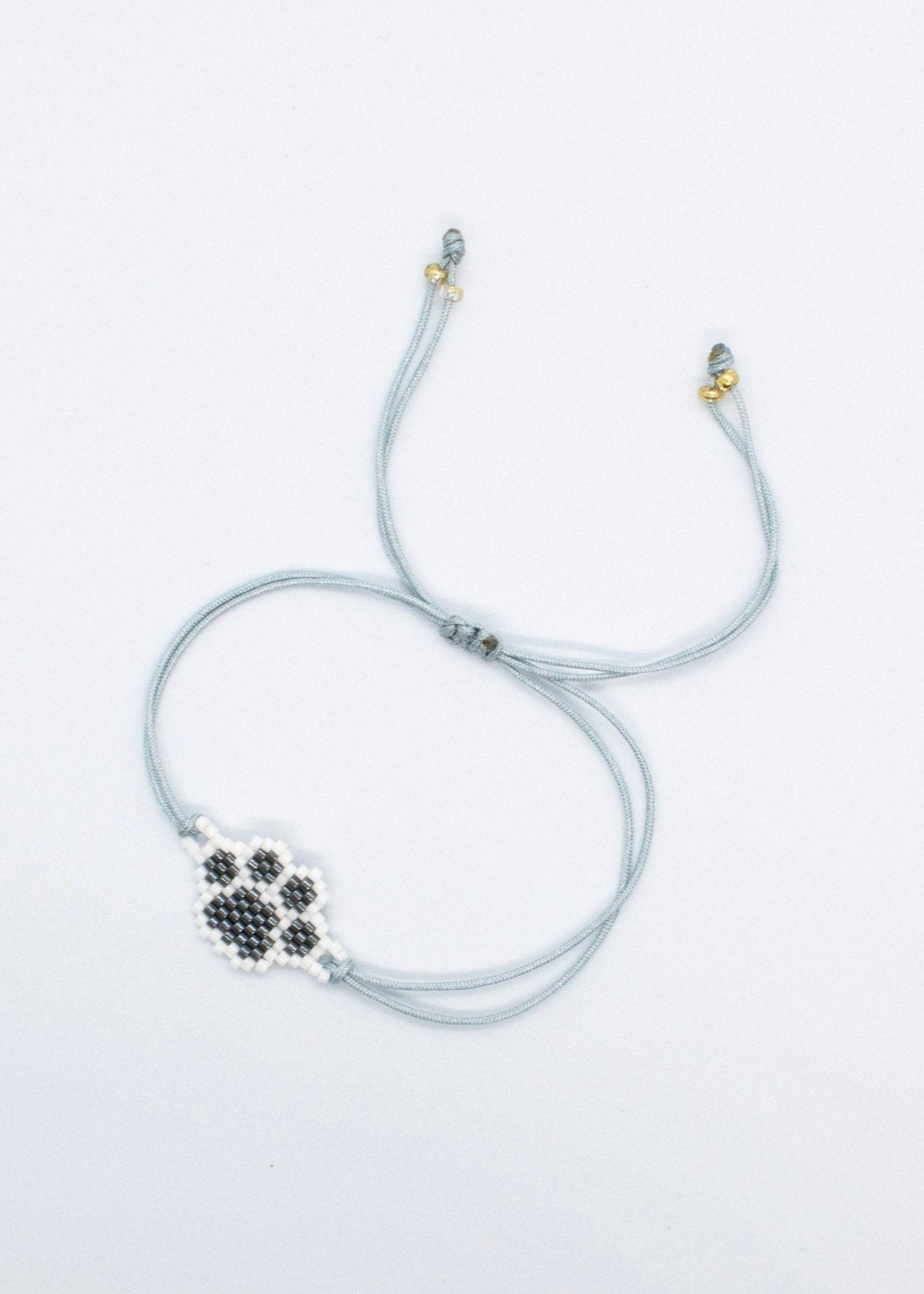 Miyuki grey paw bracelet