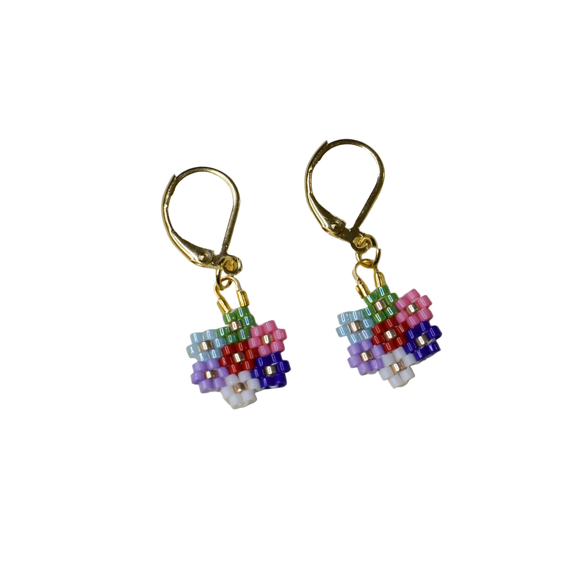 Pair of beaded flower earrings on a beige background