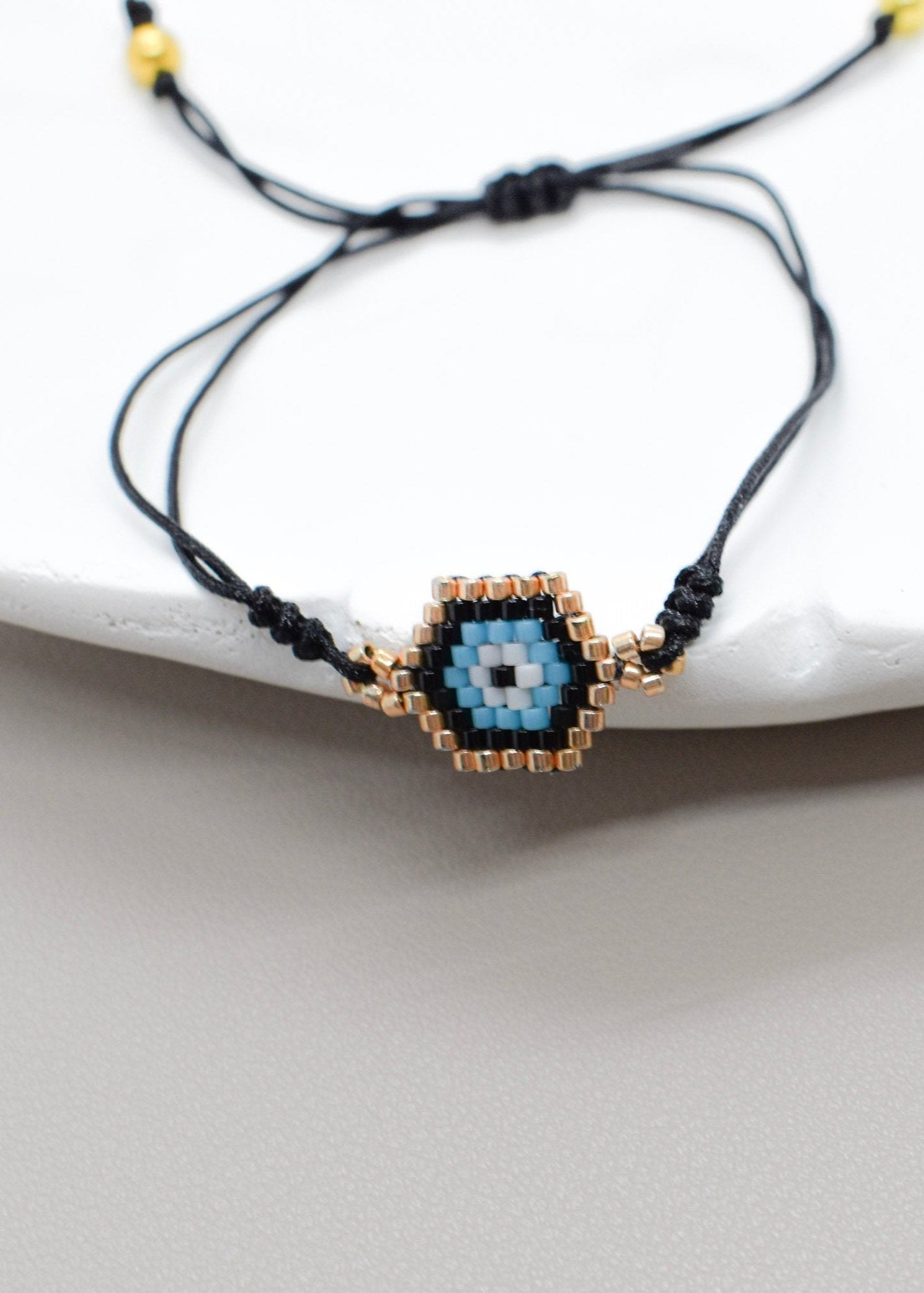 Small evil eye braceles black