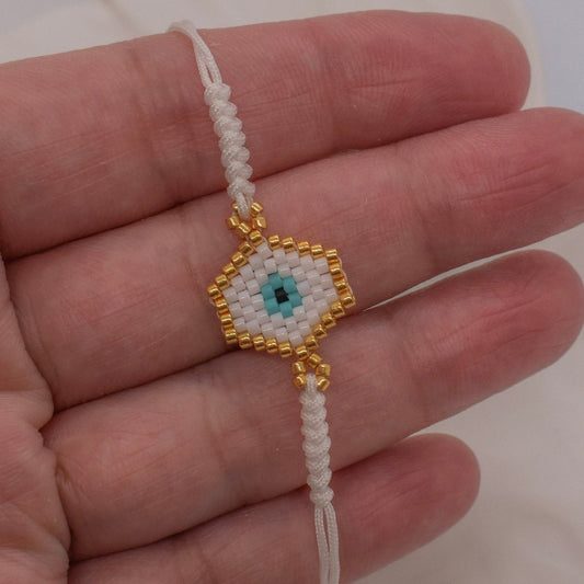 White evil eye bracelets