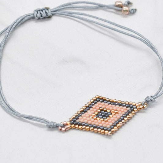 beige geometric bracelets