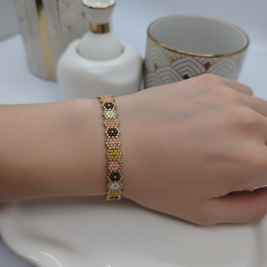 Ai generated hand wearing a beaded bracelet with decorative background
