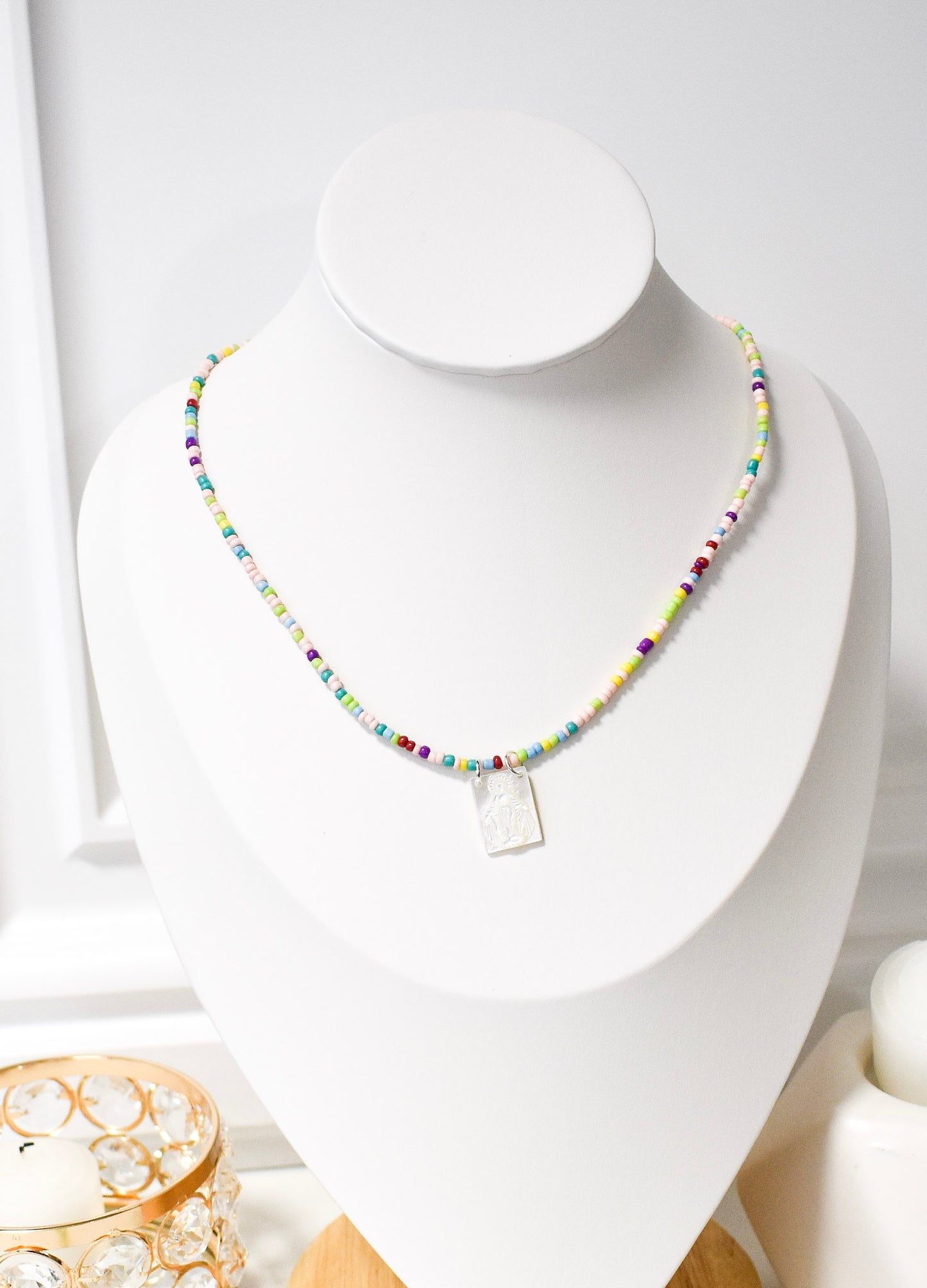 coloful white scapular on a bust
