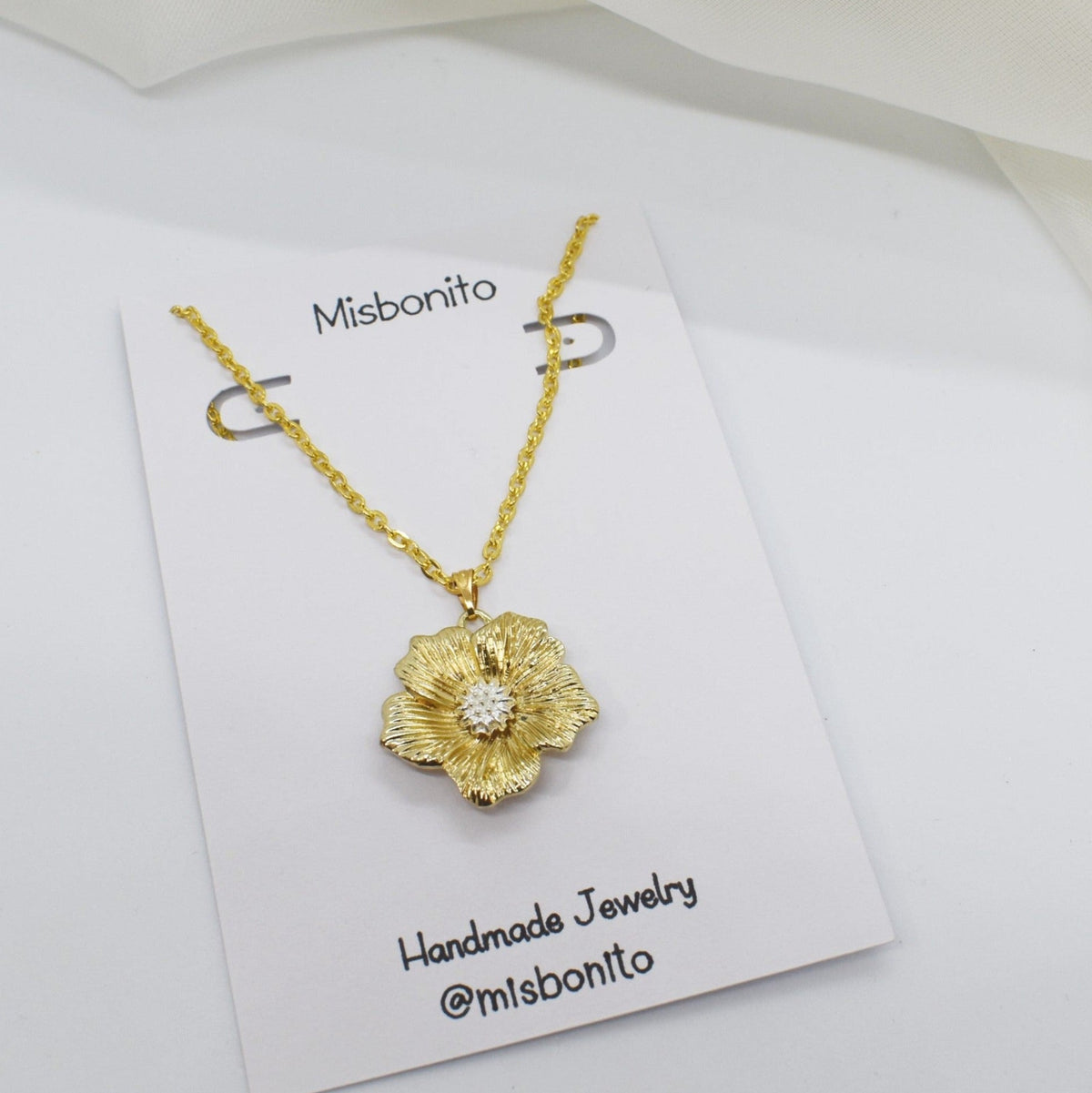 Flower necklace on a card