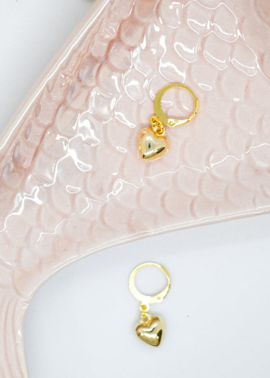 Heart charm hoops on a tray