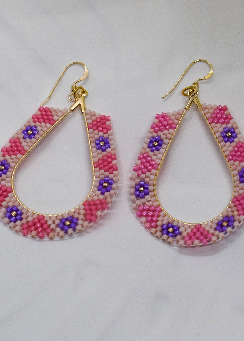 oval pink beaded earrings
