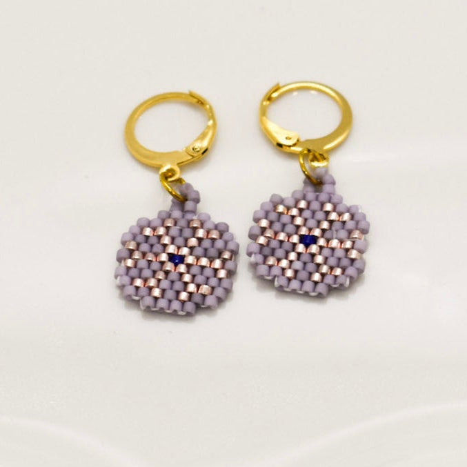 purple earrings snow