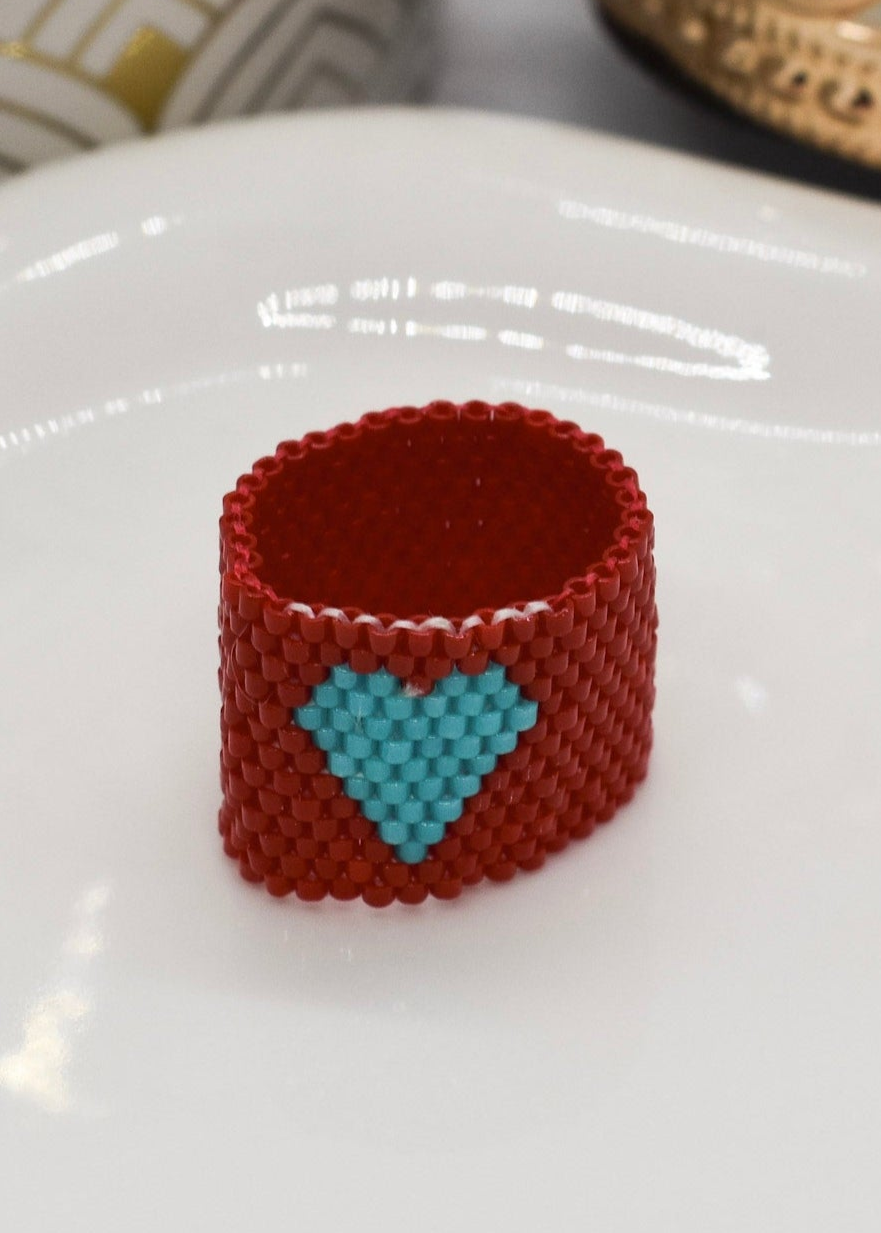 red heart miyuki ring on a tray
