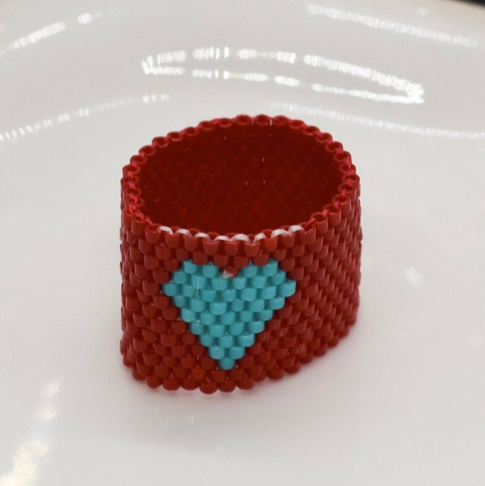 red heart miyuki ring on a tray