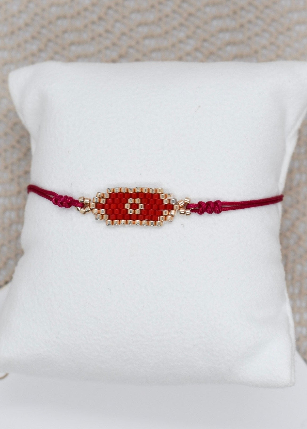 red small bar evil bracelet