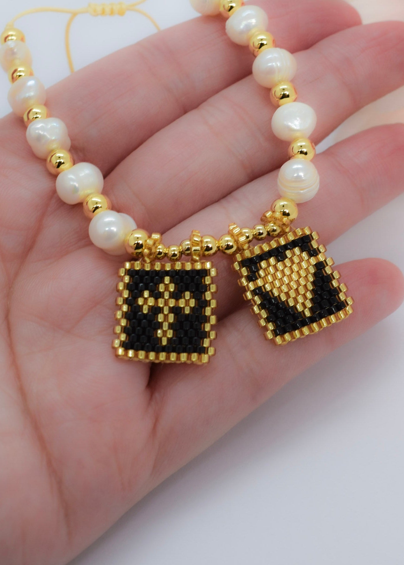 Black scapular bracelet