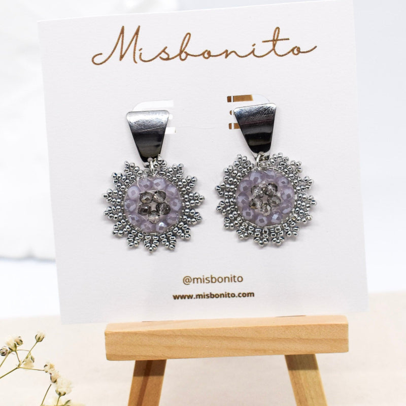 silver beaded earrings on a card