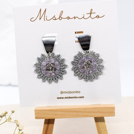 silver beaded earrings on a card