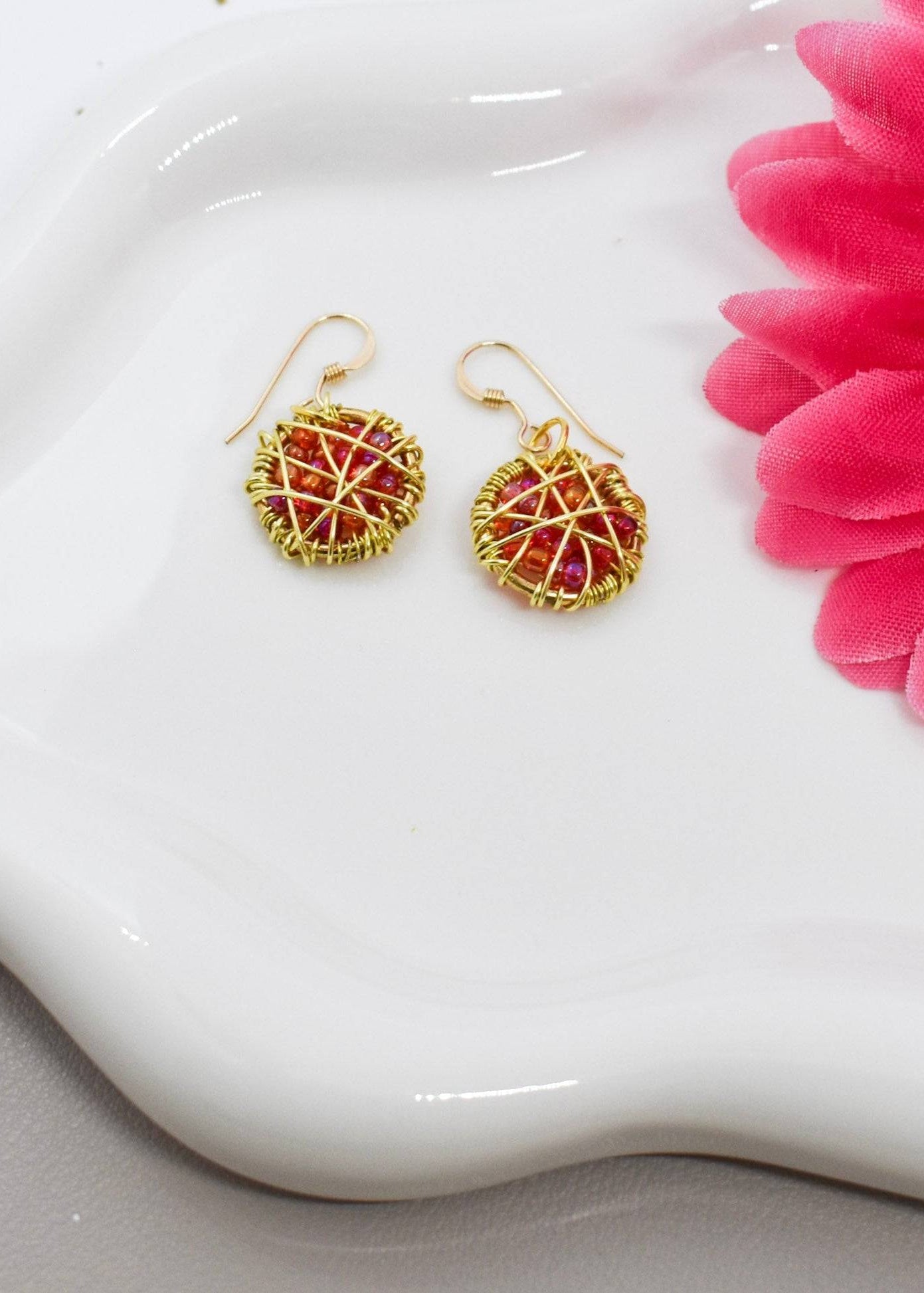 whire wrapped orange earrings
