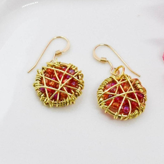 whire wrapped orange earrings