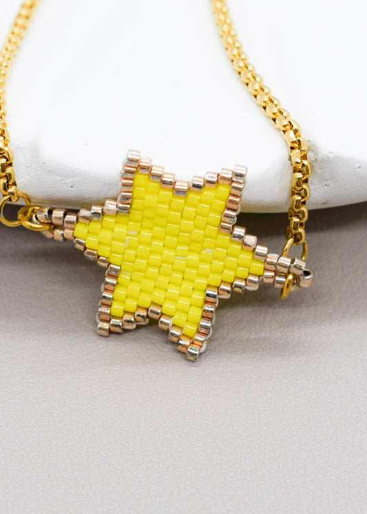 yellow star bracelet closeup