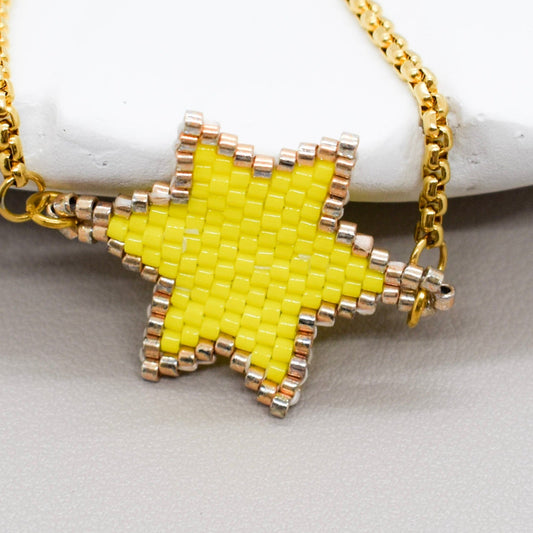 yellow star bracelet closeup