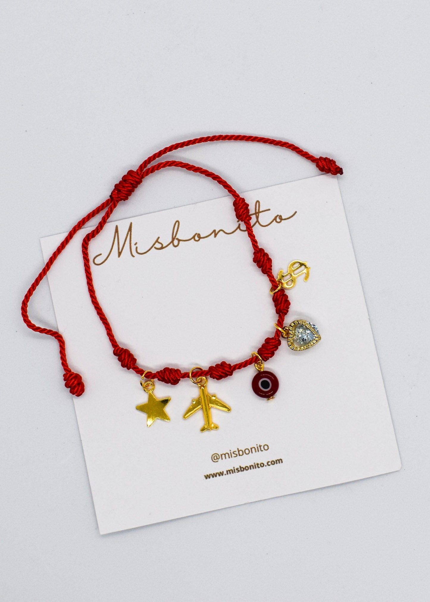 Bracelet with charms on a Misbonito branded card