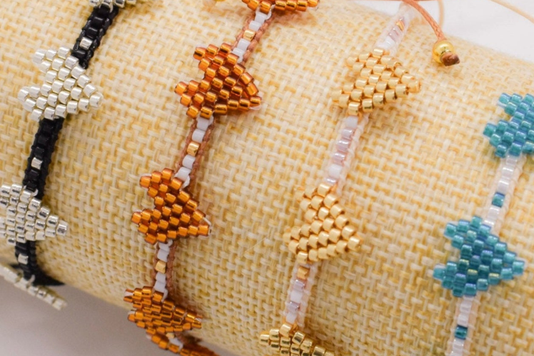 heart bracelets on a tube display