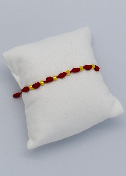 7knots bracelet with golden beads
