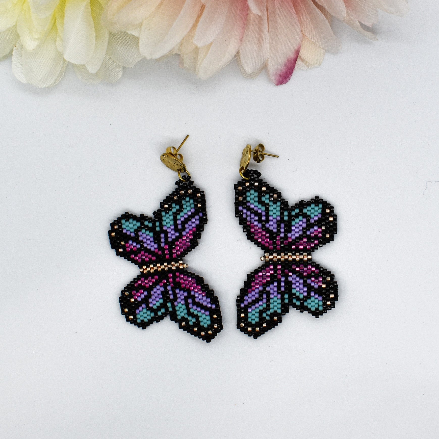 beaded butterfly pink earrings