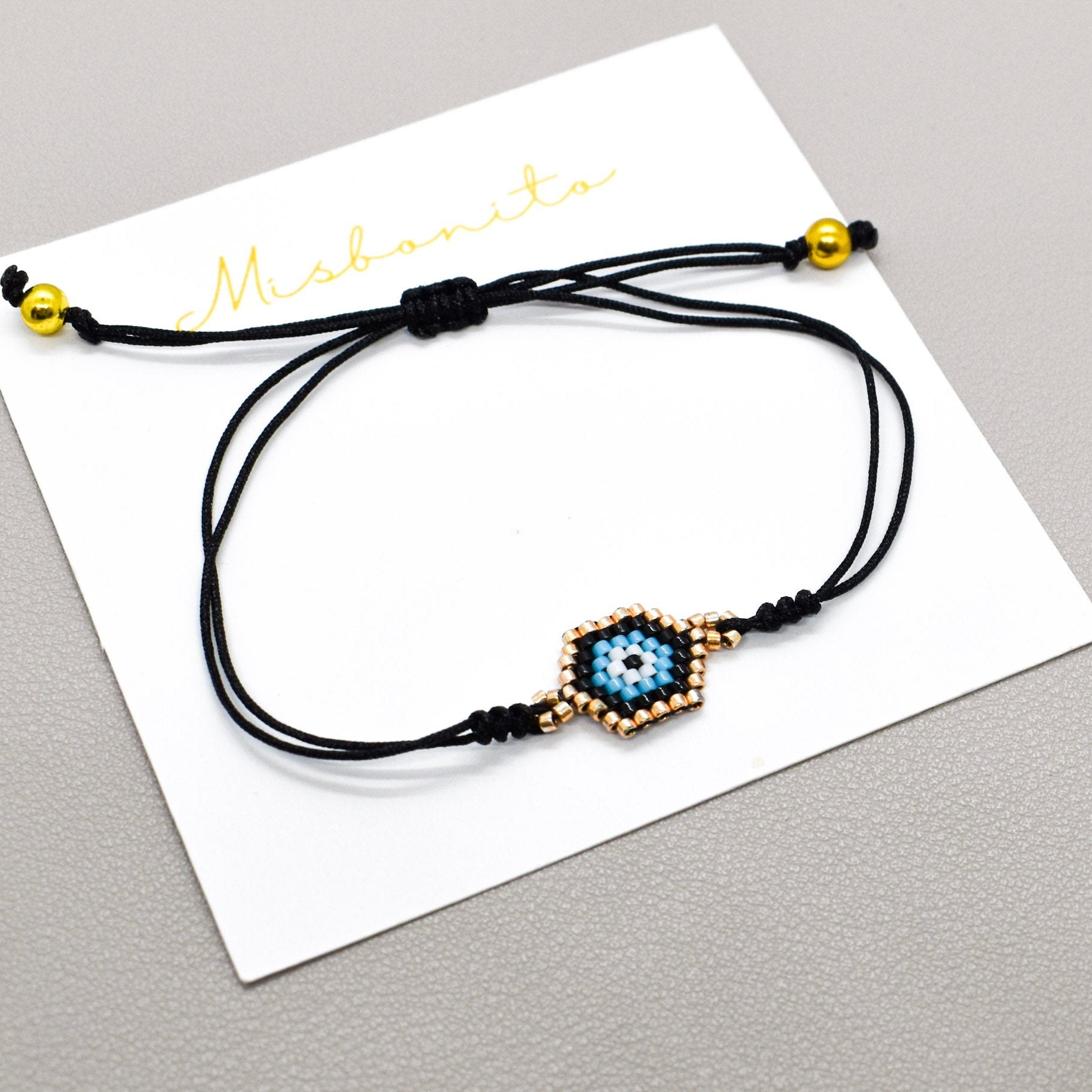 Black small evil eye bracelet