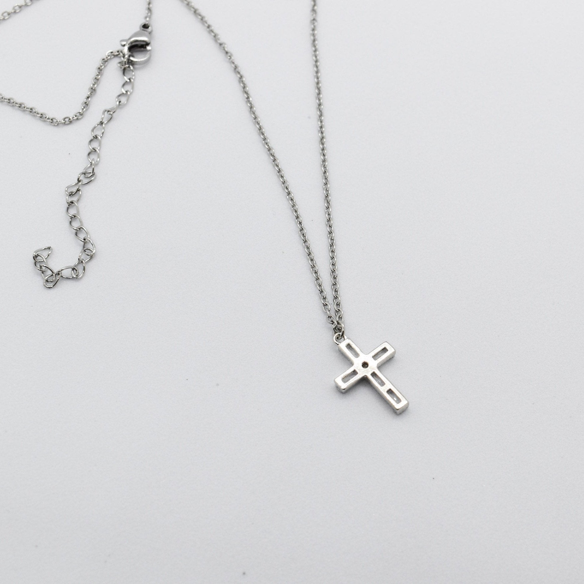 Dainty cross silver necklace back