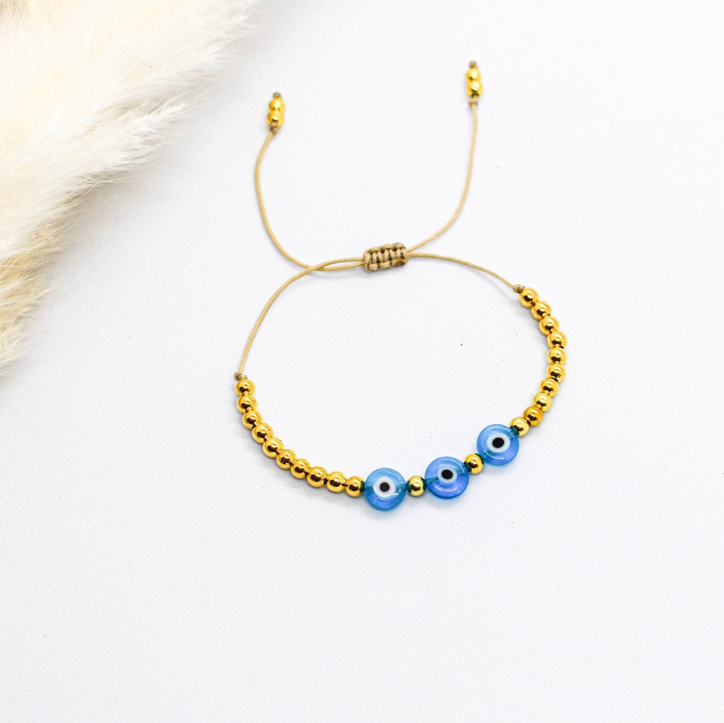 Evil eye blue and gold bracelet