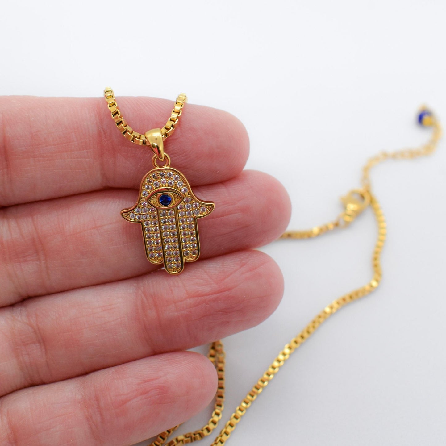 Hamsa Hand Charm Necklace on hand