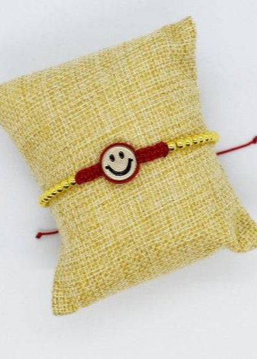 Happy face bracelet red