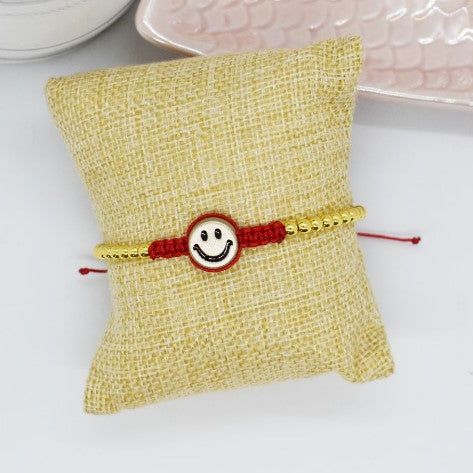 Happy face bracelet reds