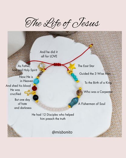 Bracelet with beads and text about 'The Life of Jesus' on a white background