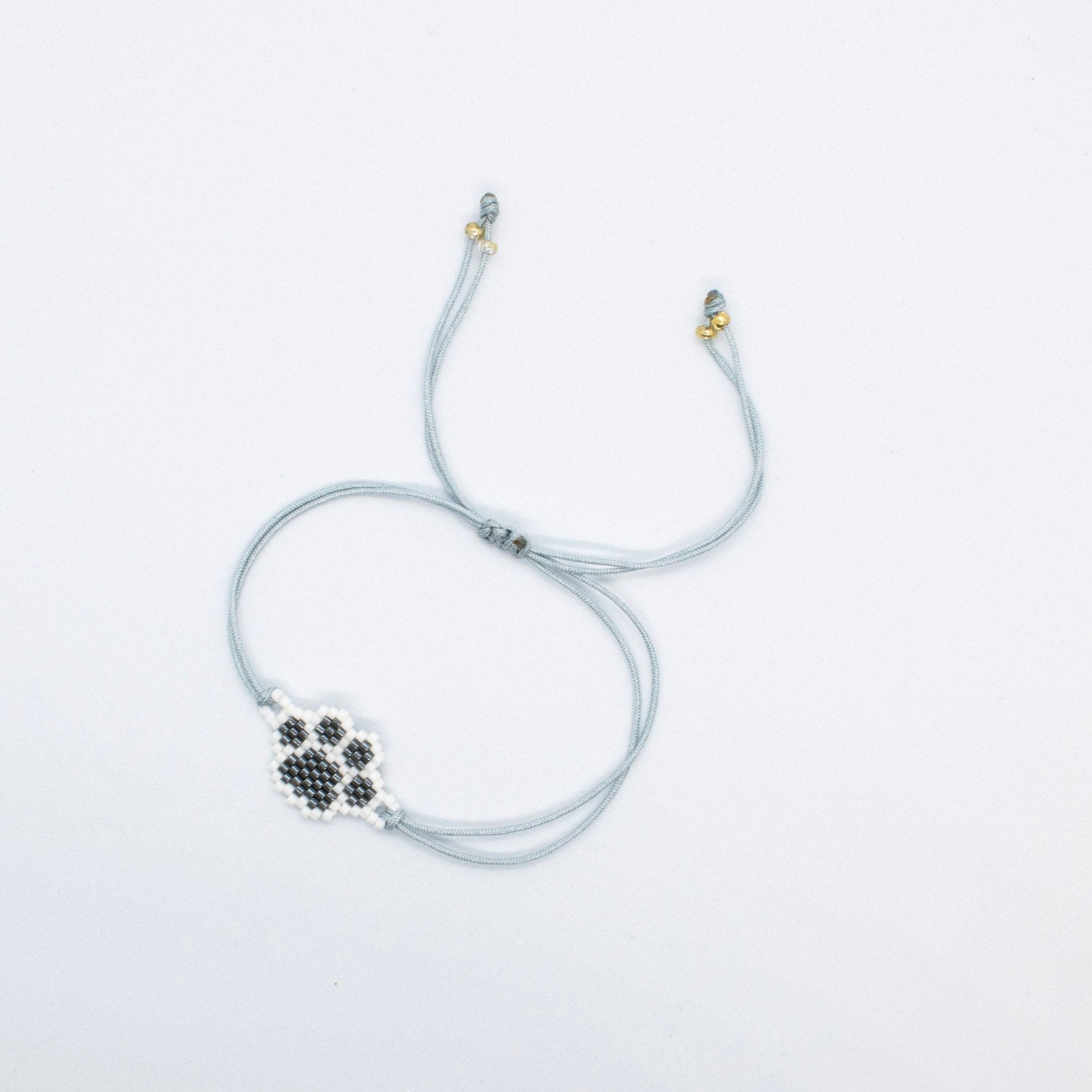 Miyuki grey paw bracelet