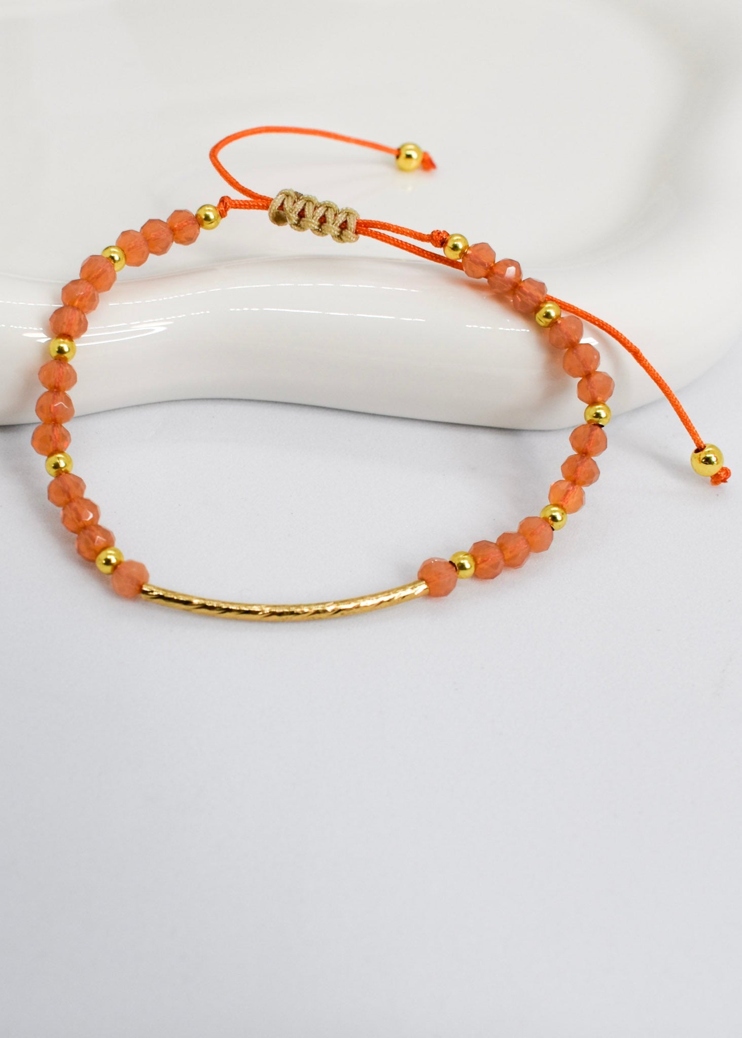 Orange tube bracelet
