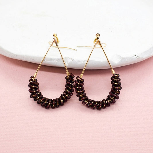 Shimmering oval beaded earring