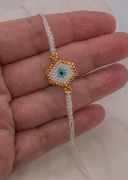 White evil eye bracelets