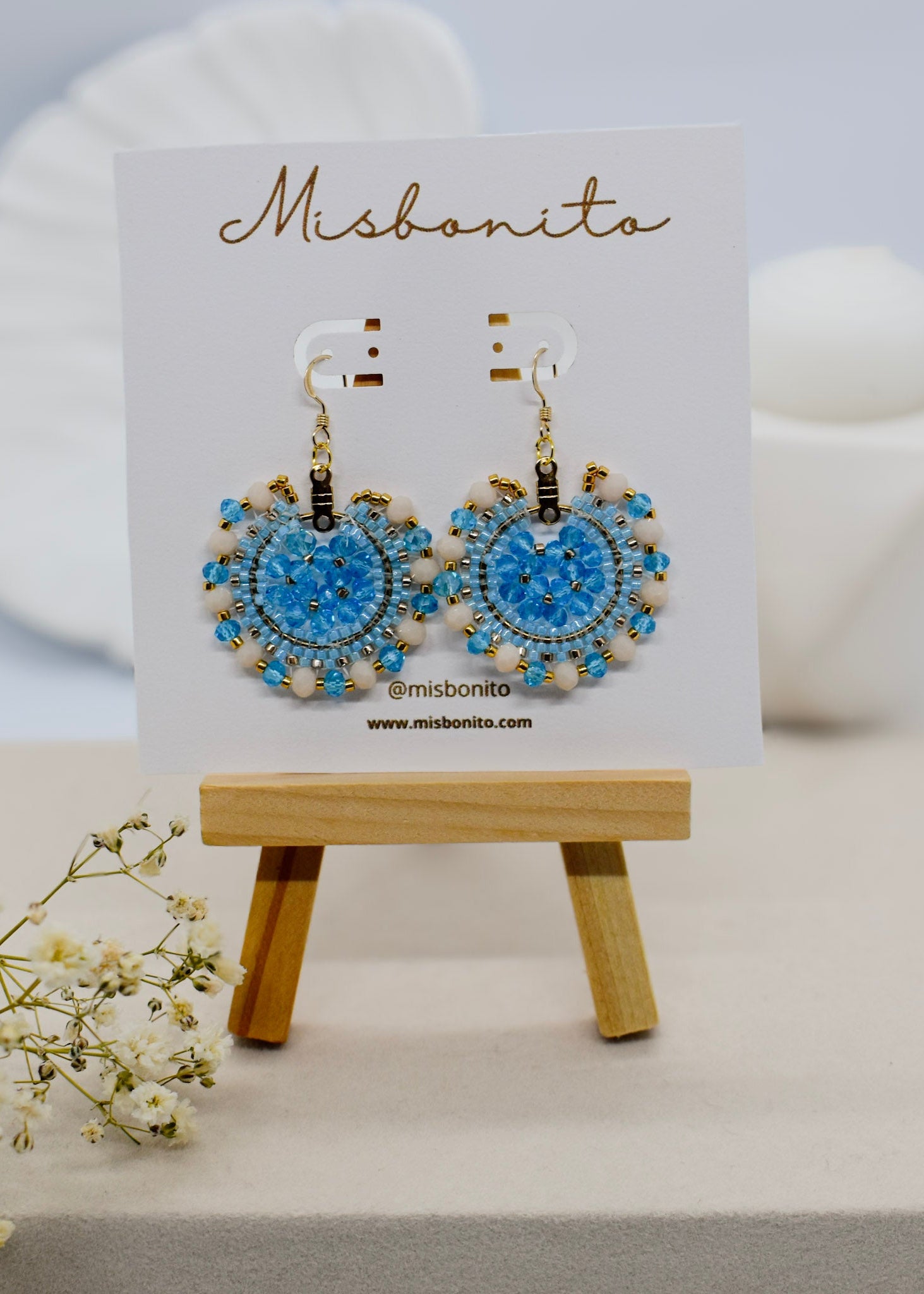 beaded blue earrings on a card