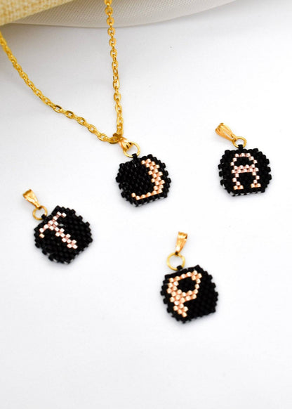 black miyuiki letter necklaces