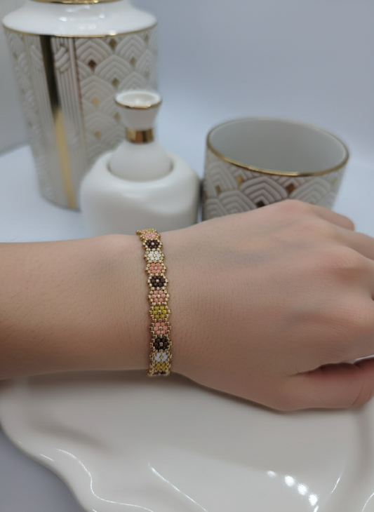 Ai generated hand wearing a beaded bracelet with decorative background