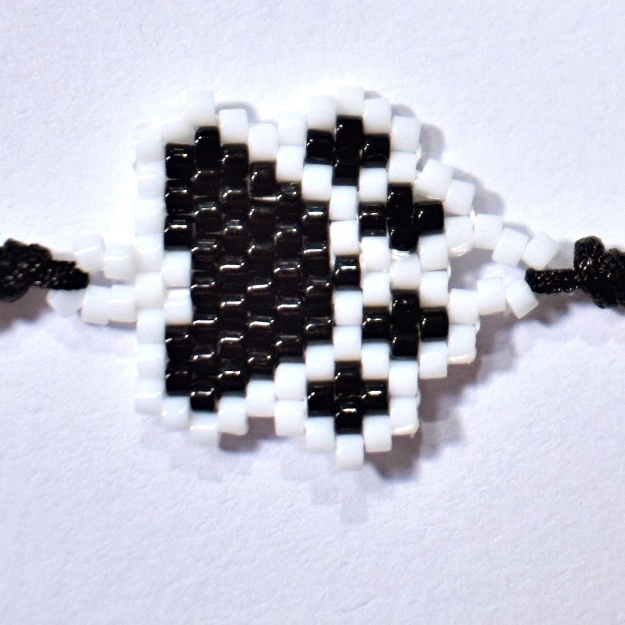 Black beaded paw bracelet zoomed