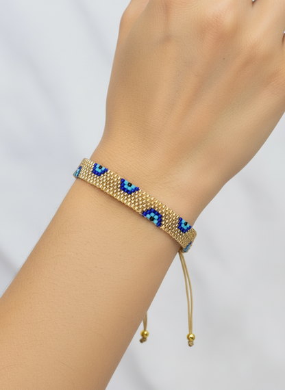 evil eye bracelet on a models arm