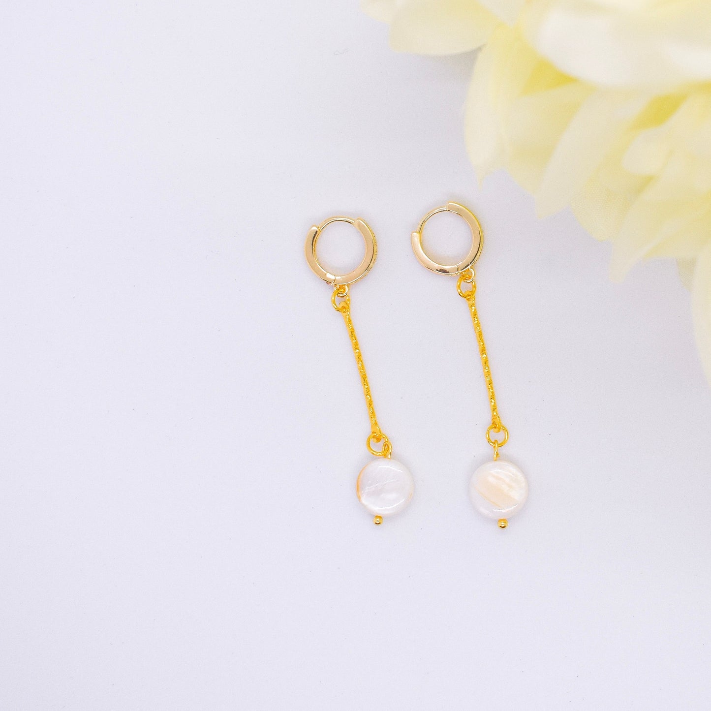 flat pearl earrings