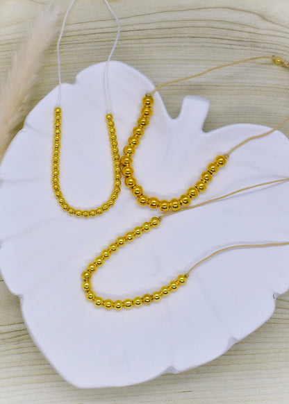 golden trio of bracelets